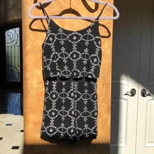 White designed black romper